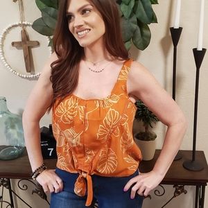 Women's sleeveless blouse with tie waist